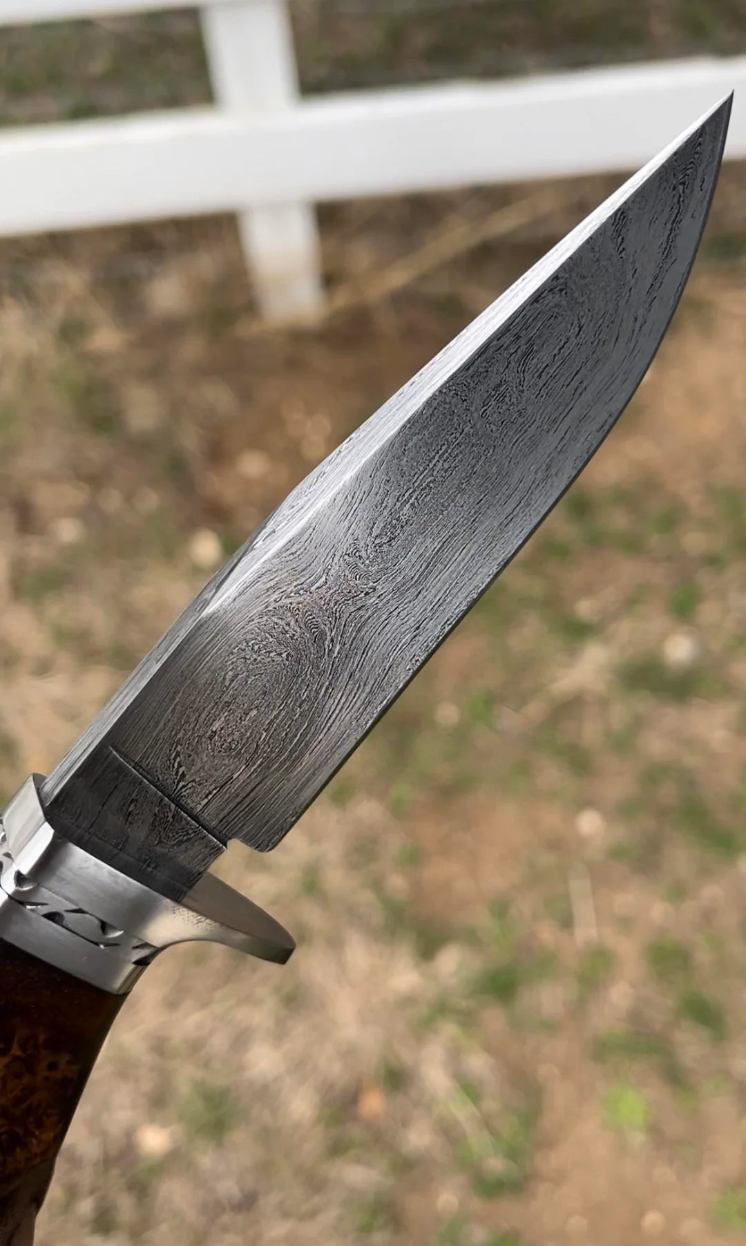 Outdoorsmen Engraved Damascus Knife