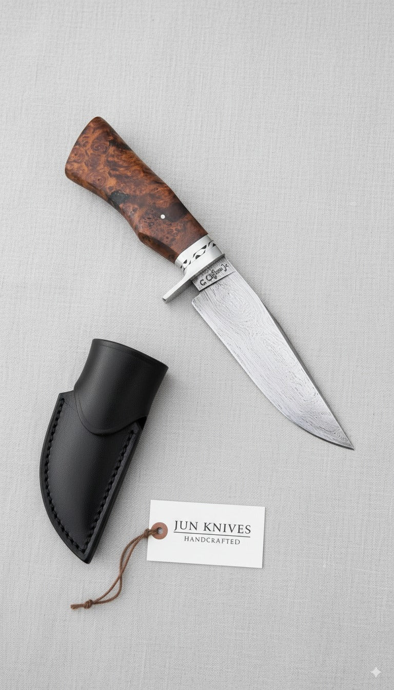 Outdoorsmen Engraved Damascus Knife